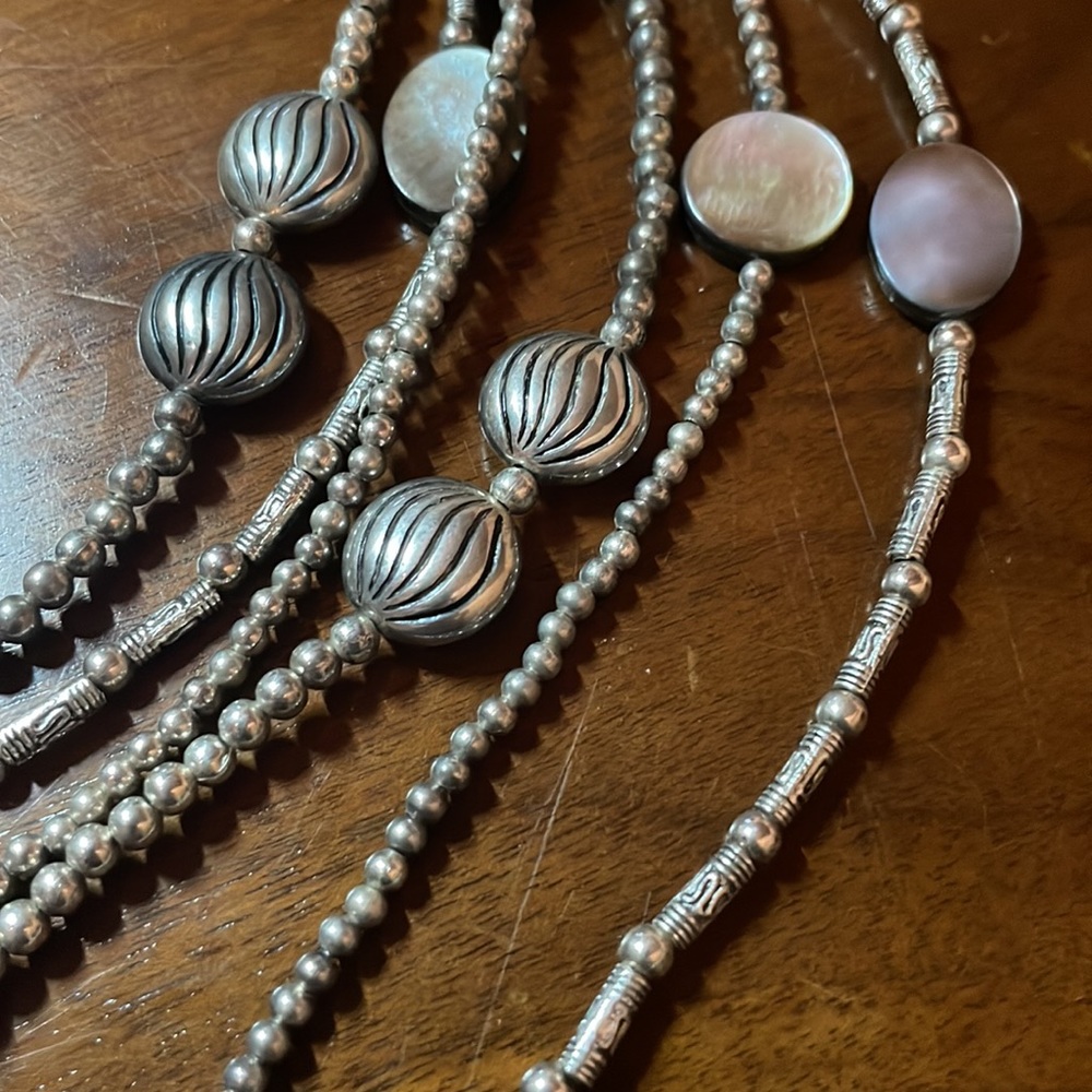 Long silver beaded necklace